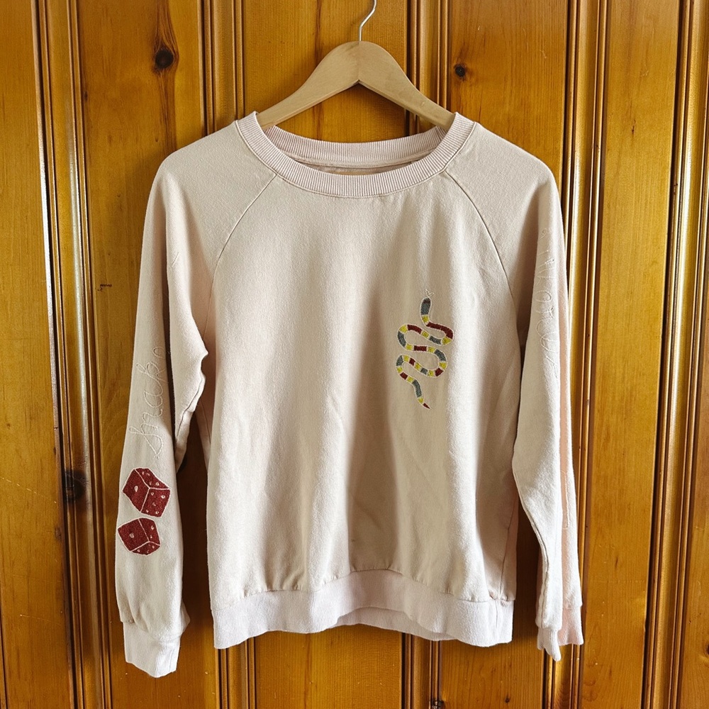 Banner Day Light Pink Sweatshirt with Snake and Dice Design